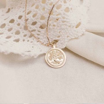 Taufmedaille mit reliefiertem Baum des Lebens