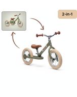 green metal trybike balance bike